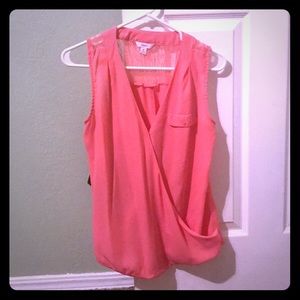 Candie’s pink criss cross sleeveless blouse